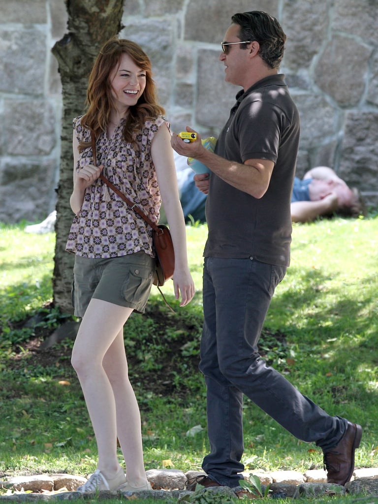 While plot details about Woody Allen's latest film are still tightly under wraps, we know one thing for sure: stars Emma Stone and Joaquin Phoenix are laughing a lot. The actors started filming the untitled project together in Rhode Island on Monday, cracking up in Newport first, then moving to Providence for more funny scenes on Wednesday. This is Phoenix's first project with Allen and Stone's second. She will make her debut in Allen's Magic in the Moonlight when it premieres July 25. Stone and Colin Firth costar in that movie, in which he tries to expose her fortune-teller character as a fraud but ends up falling for her along the way. Phoenix and Stone's age gap will be slightly less than Firth and Stone's (39 and 53 to her 25, respectively), but we'll have to wait and see how similar or different these two Allen films will be.