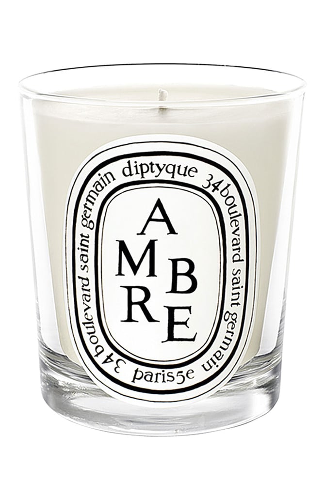 "One of my favorite things in the world is the warm, inviting scent of a beautiful candle. Every Diptyque Scented Candle is almost magical, the way they weave so many gorgeous spices, flowers, fruits, and leaves together to create an incredible story. I love giving them as a gift and enjoy knowing that their scents will fill the homes of all of my friends and loved ones." — Anastasia 
Diptyque Amber Scented Candle ($80)