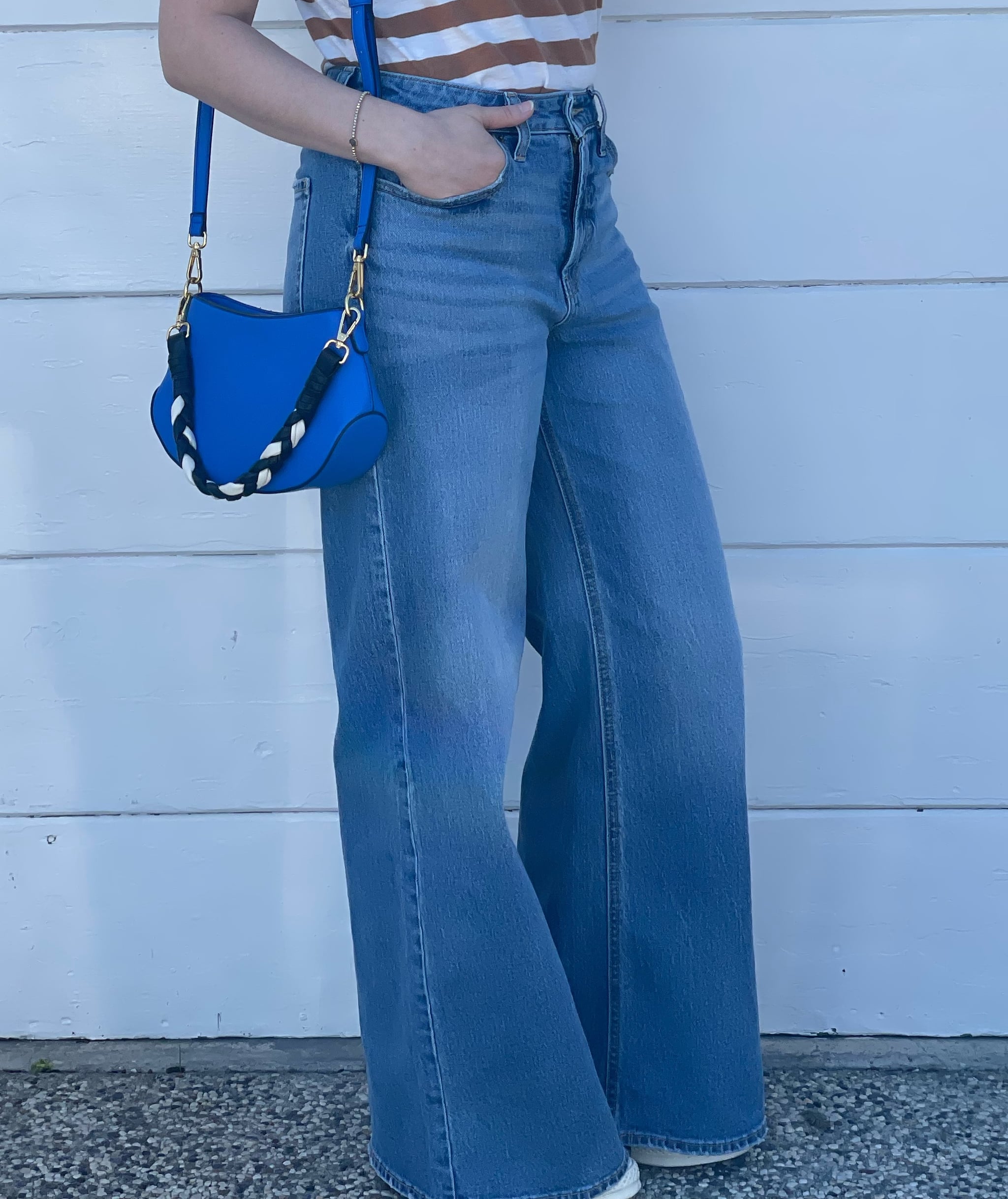 woman wearing Old Navy's high-waisted, wide-leg jeans