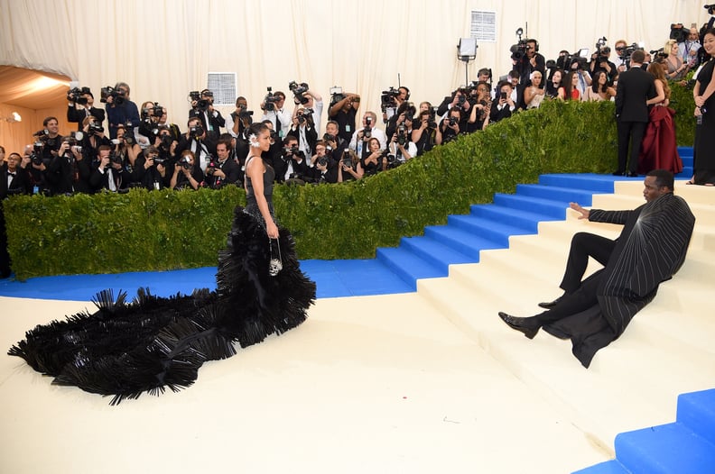 The Adorable Moment When Diddy Laid Down on the Met Gala Red Carpet to Get a Better Look at Cassie's Amazing Dress