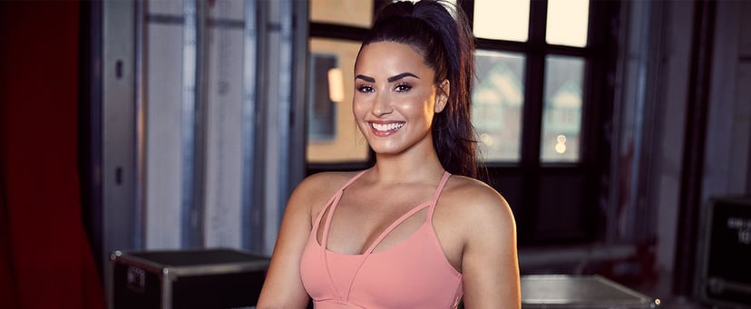 Demi Lovato models busty sports bra before showing off 'glam' makeup she  did herself