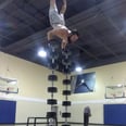 Prepare to Be Stunned at This Guy Doing Handstand Push-Ups on Top of Stacked Weights