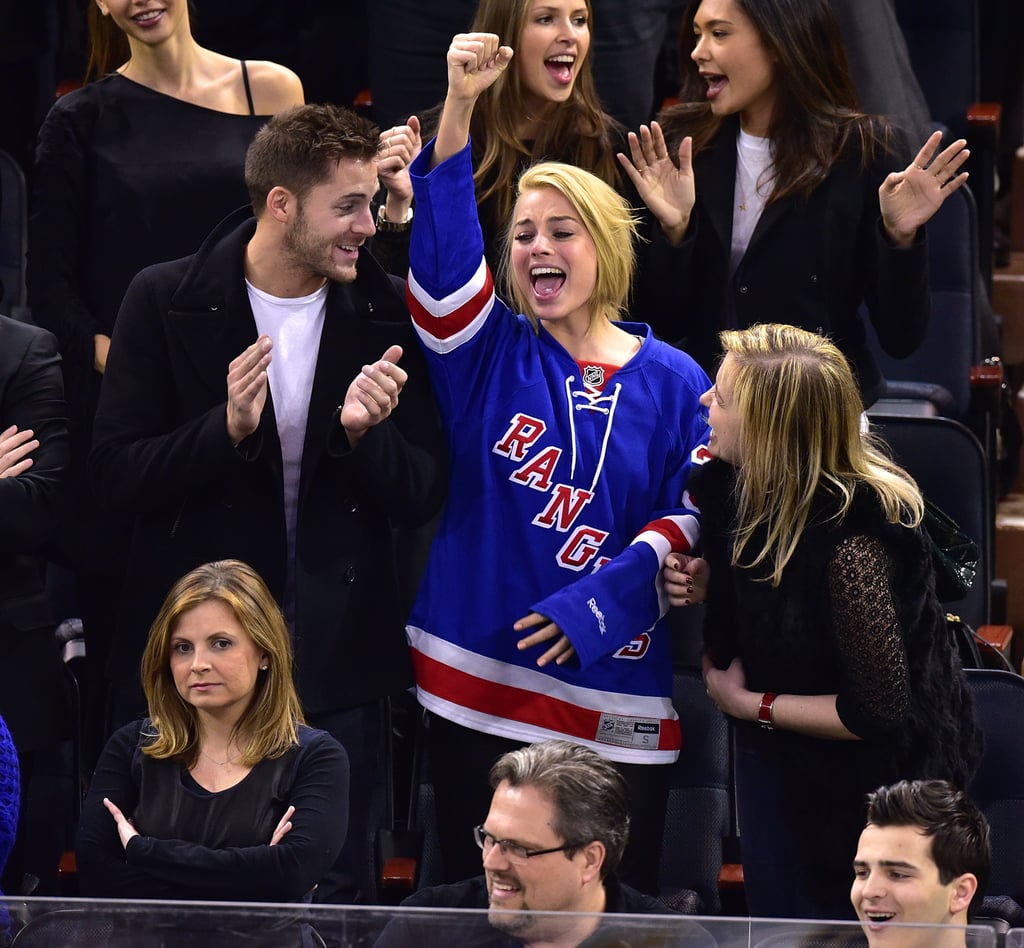 Margot Robbie and Tom Ackerley at NY Rangers Game