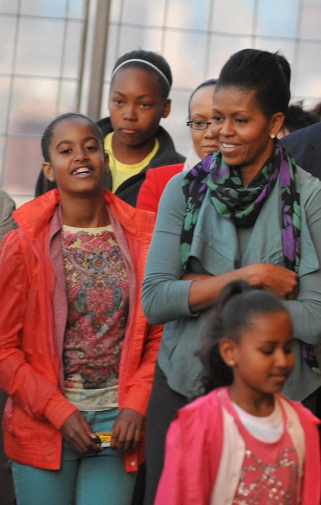 In June 2009, First Lady Michelle Obama toured the Eiffel Tower with daughters Malia and Sasha.