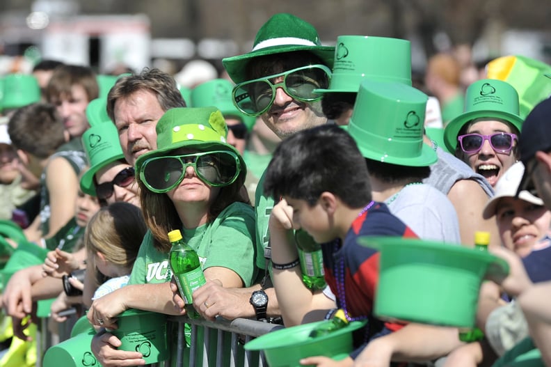 Chicagoans sport big green glasses and big green hats.