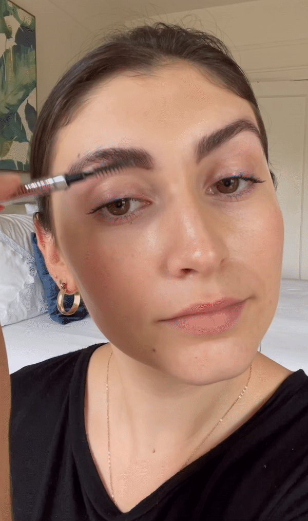 For me, on one side, the point matched with my natural arch well but on the other side, it didn't as much. I felt it looked a little off but I pushed through. That marks the end of the filling in portion — next you clean up the edges, which was a must for me (I used a Q-tip and some micellar water), and then brush the hair up into place. That's when I finally used the clear brow gel.
