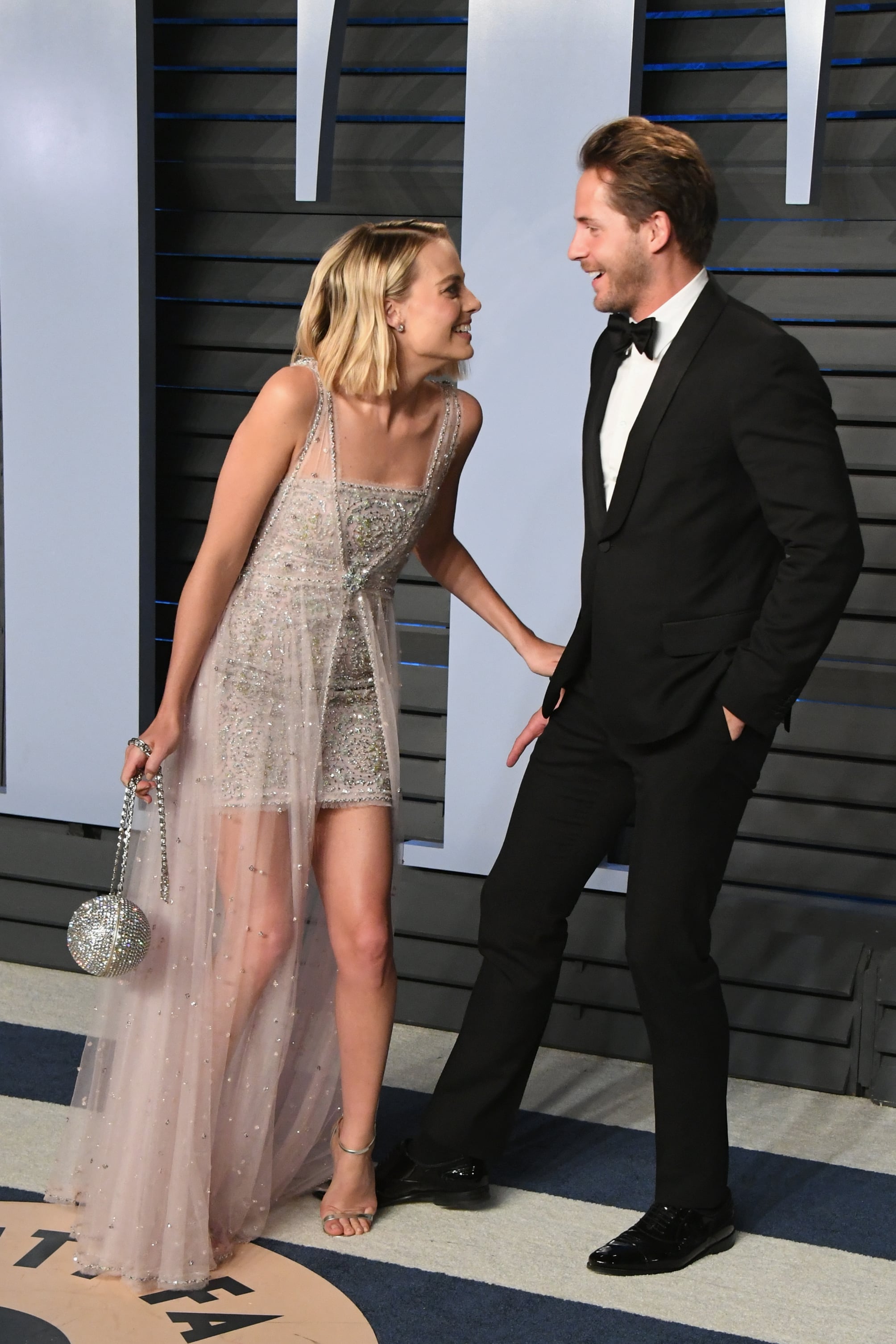 BEVERLY HILLS, CA - MARCH 04: Margot Robbie (L) and Tom Ackerley attend the 2018 Vanity Fair Oscar Party hosted by Radhika Jones at Wallis Annenberg Centre for the Performing Arts on March 4, 2018 in Beverly Hills, California.  (Photo by Jon Kopaloff/WireImage)