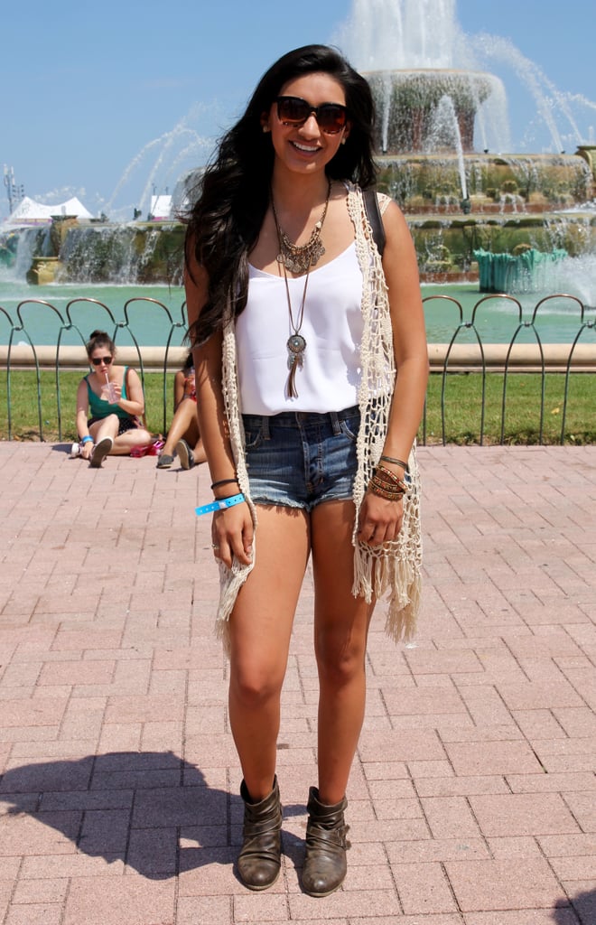 When she worried her denim cutoffs were too short, she expertly offset them with a long crocheted vest.