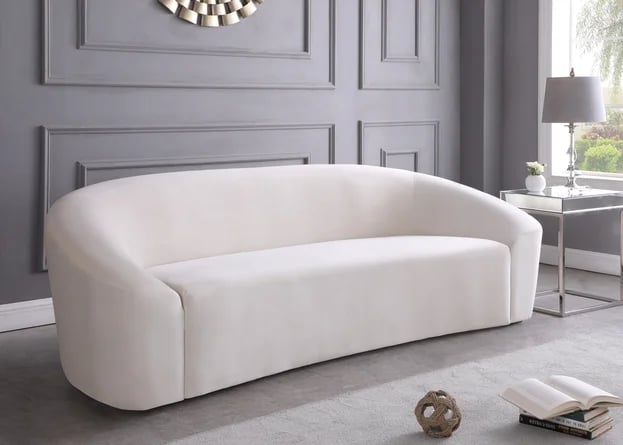 Something Sleek: Robeline Velvet Curved Sofa