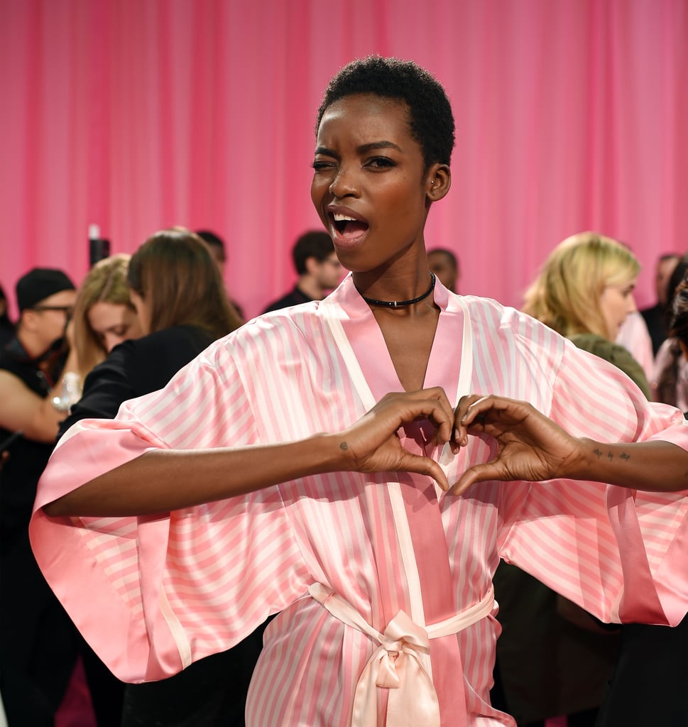 We heart Maria Borges! She flirts for the camera backstage.