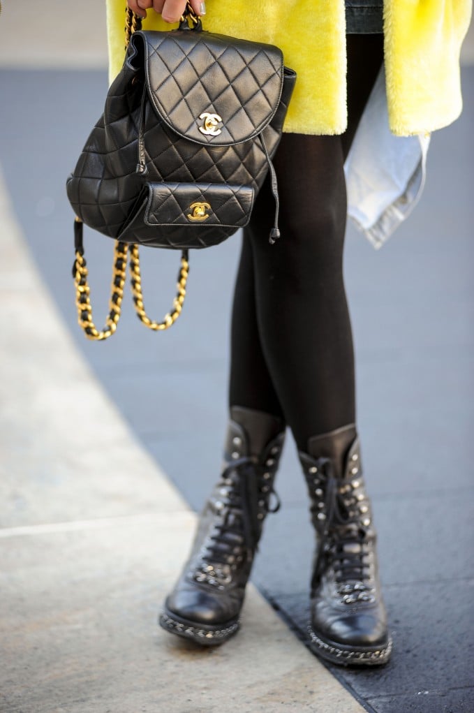 Tough-girl meets fashion fan with a Chanel backpack purse and combat ...