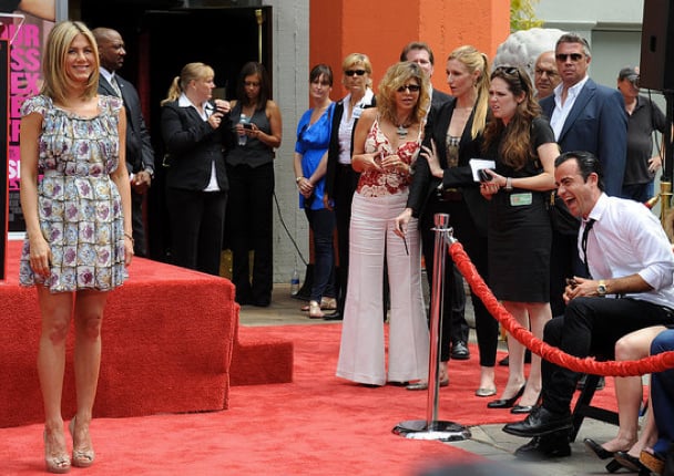 Justin was full of laughs during Jen's July 2011 Hand and Footprint ceremony in LA.