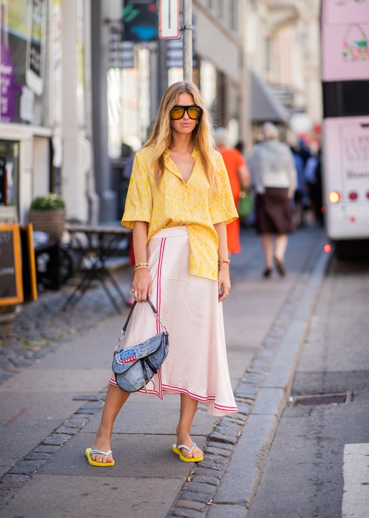 Styling a yellow pair with a button-down top and matching skirt.