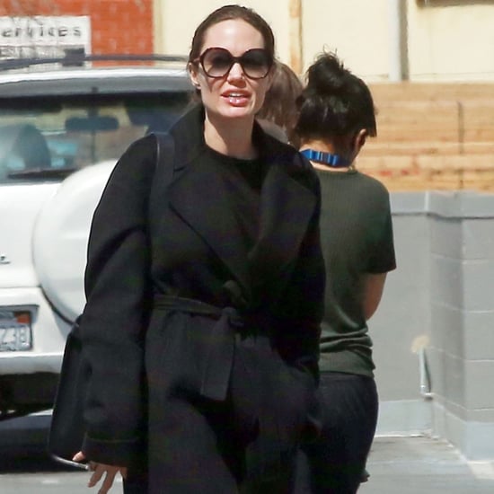 Angelina Jolie Wearing Black Trousers