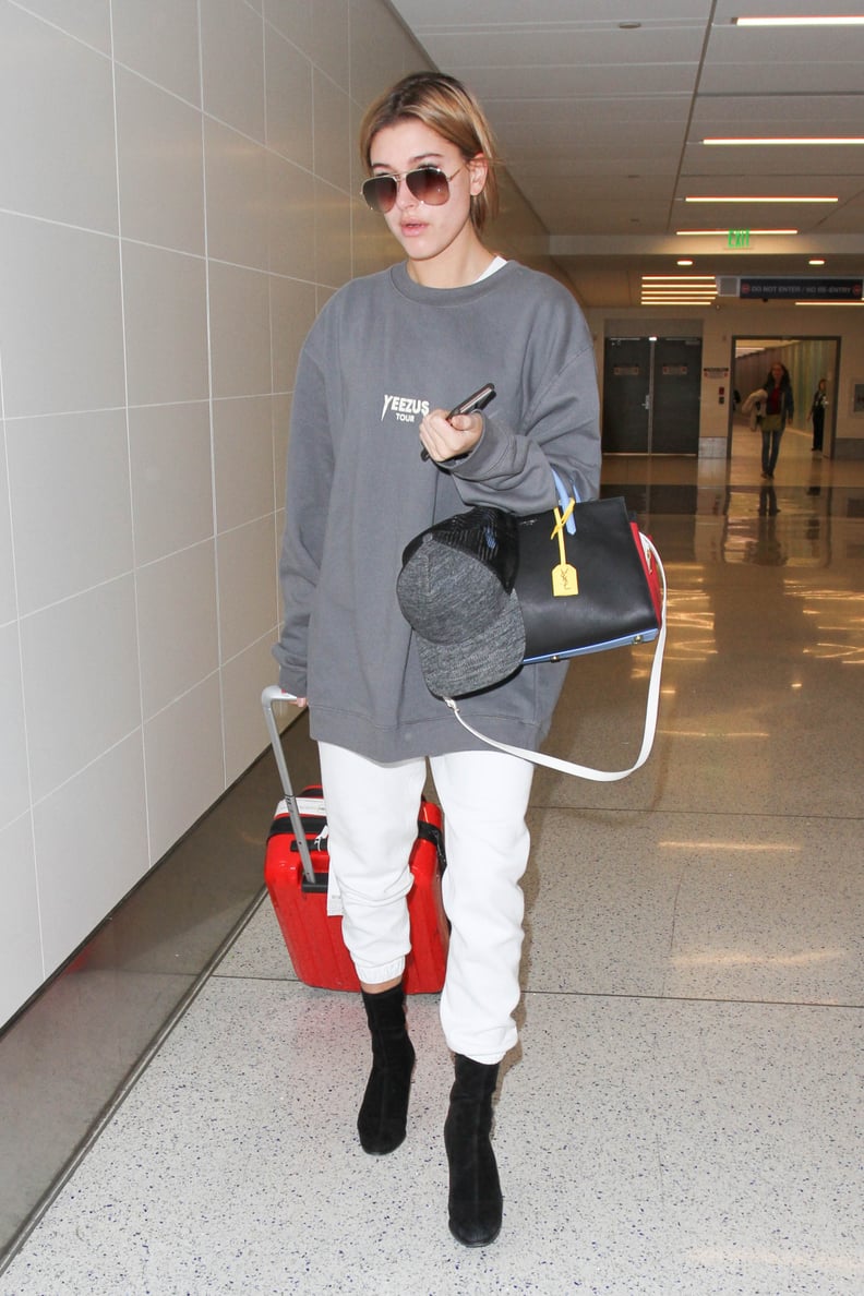 Hailey Baldwin Carrying a Saint Laurent Small Rive Gauche Colorblock Satchel