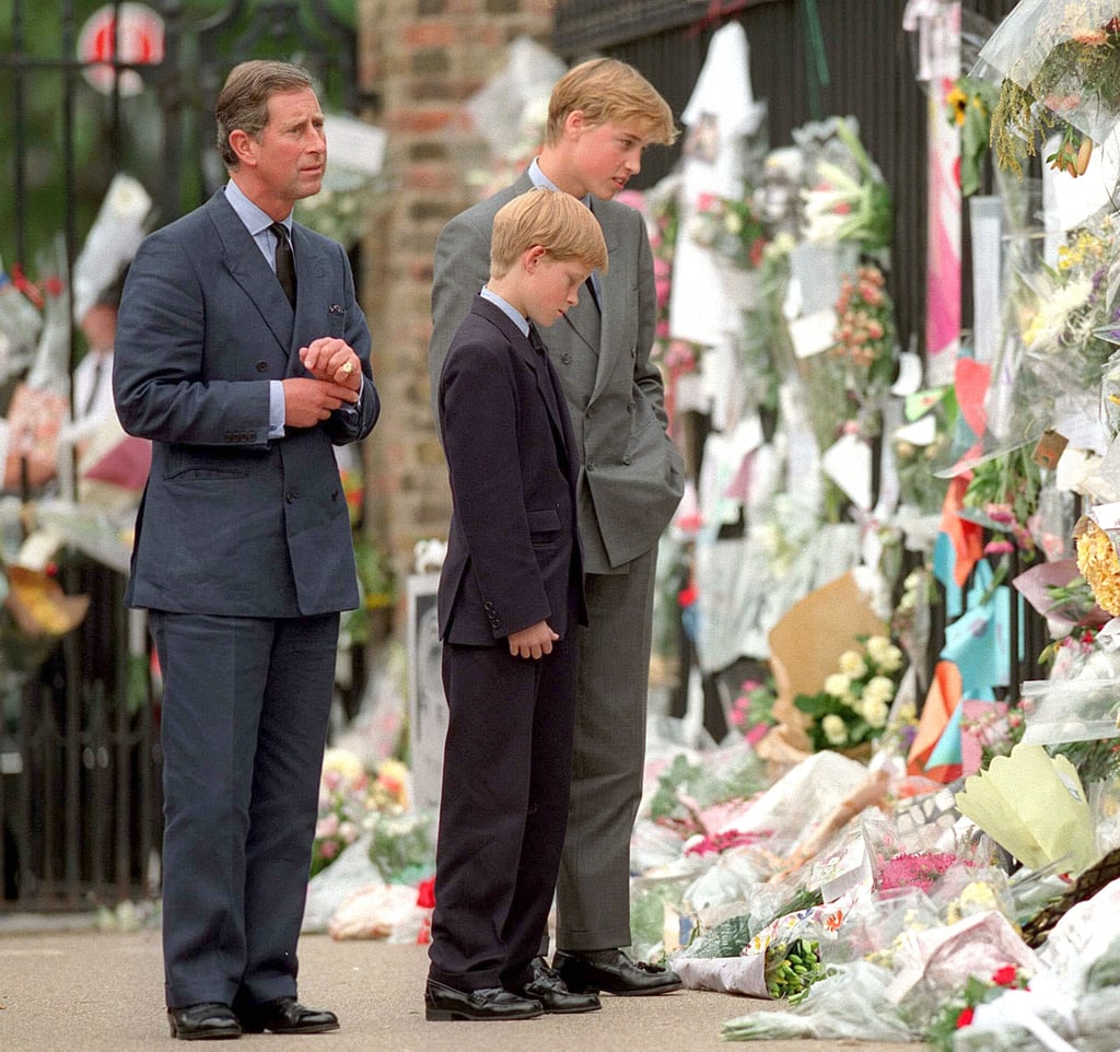 William and Harry stuck side by side as they read cards and tributes to their mother, Princess Diana, during her funeral procession in September 1997.