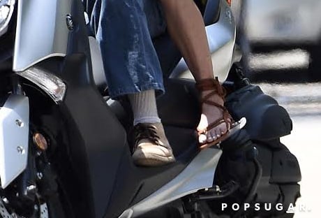 Amal Clooney Braided Sandals on Motorcycle