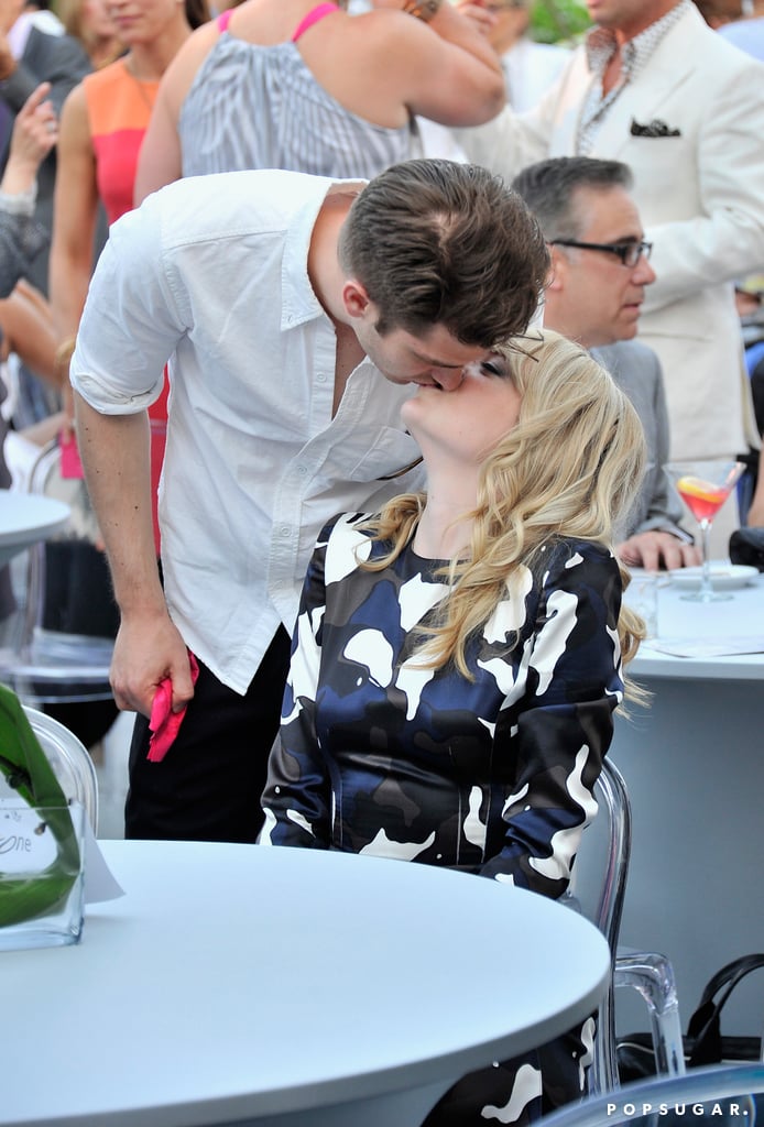 Andrew gave Emma a sweet kiss at a breast cancer benefit honoring her mom in New Jersey in May 2013.