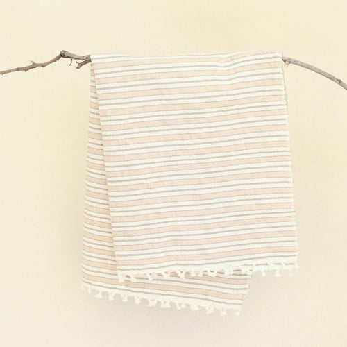 "If you haven't discovered Midland in Culver City, you're missing out! It's the best shop for gifts you won't find anywhere else, including my favorite Heather Taylor sweet towels." 
Heather Taylor Striped Tea Towel in Gold ($22)