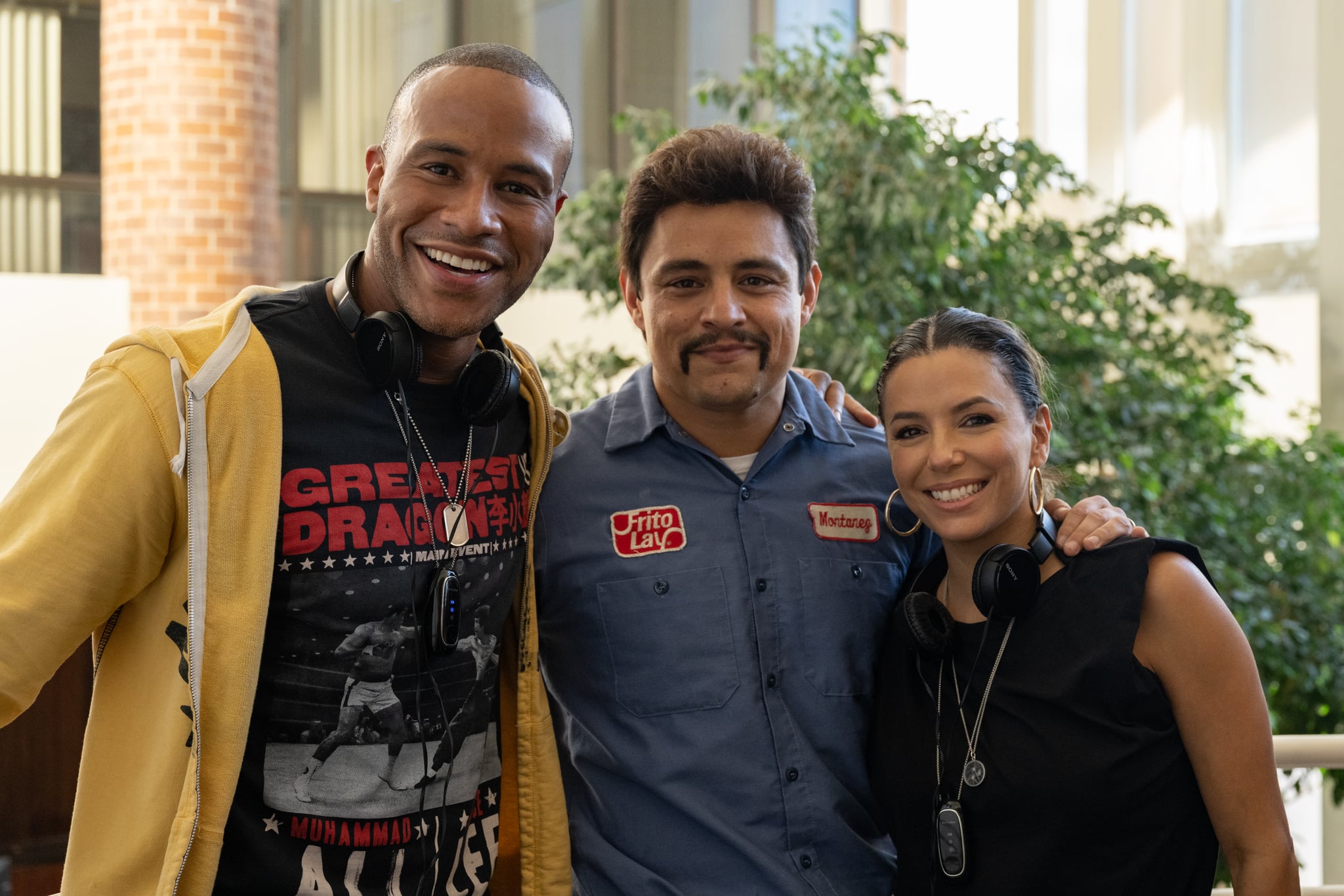 DeVon Franklin, Jesse Garcia and Eva Longoria on the set of FLAMIN' HOT.  Anna Koori's photo.  Courtesy of Searchlight Pictures.  © 2023 20th Century Studios All rights reserved.