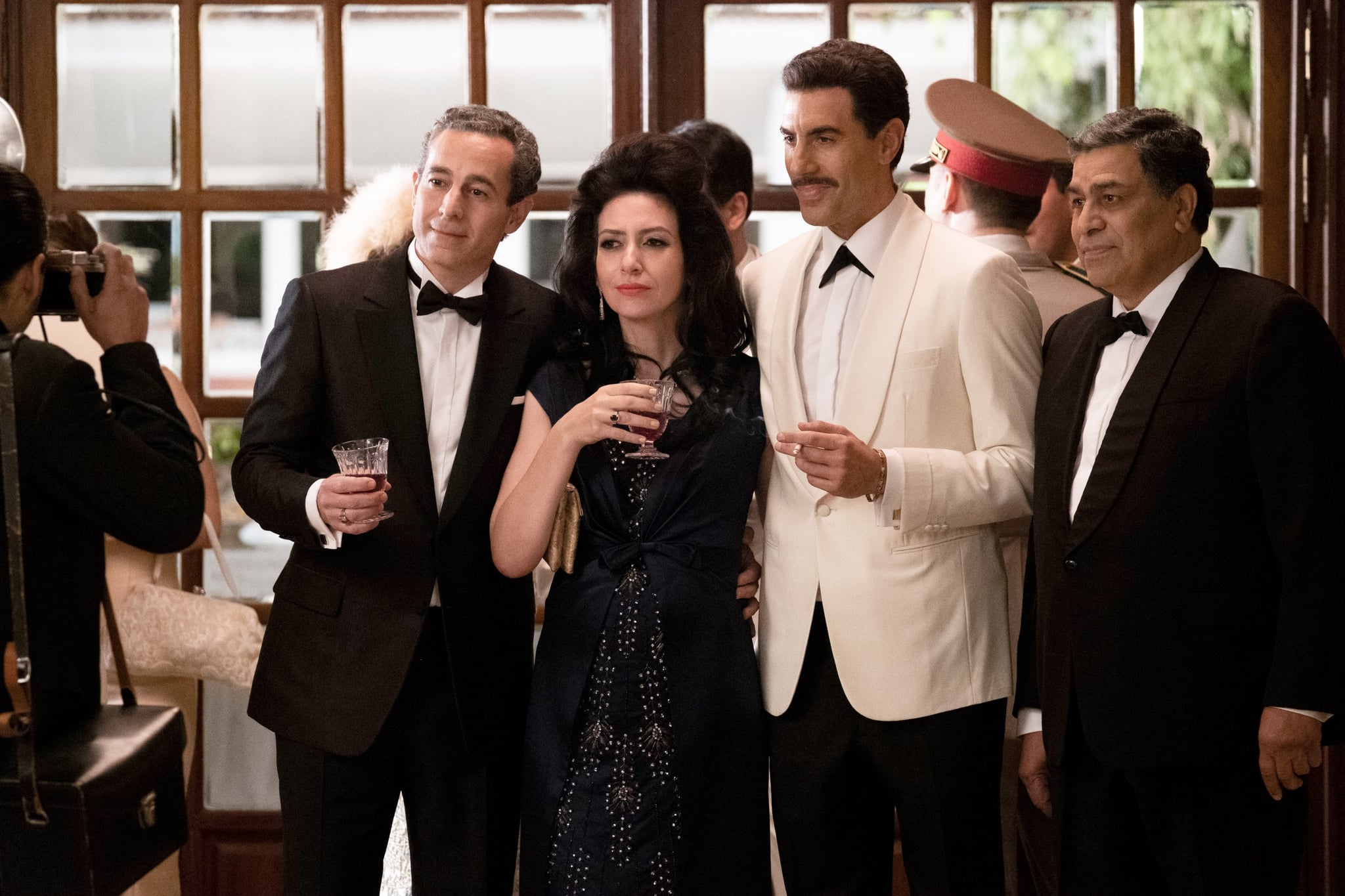 THE SPY, Waleed Zuaiter (left), Hadar Ratzon Rotem (2nd from left), Sacha Baron Cohen (2nd from right),  (Season 1, airs Sept. 6, 2019). photo: Axel Decis / Netflix / courtesy Everett Collection