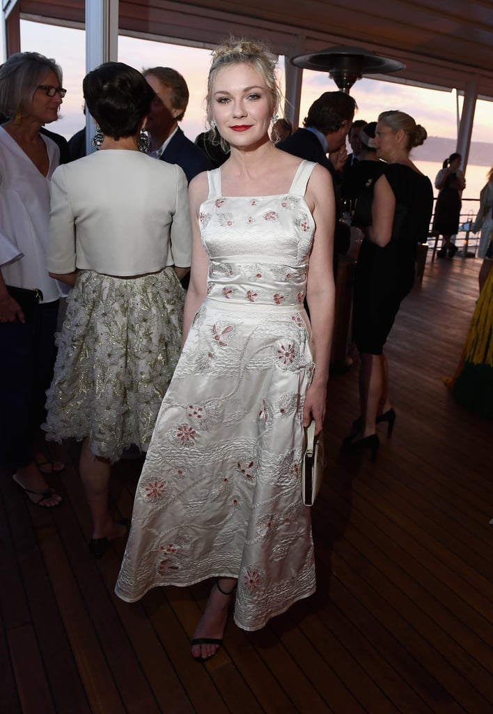 Staying true to her feminine-inspired Cannes style, Kirsten Dunst opted for a mid-length fit-and-flare at the Vanity Fair and HBO Dinner.