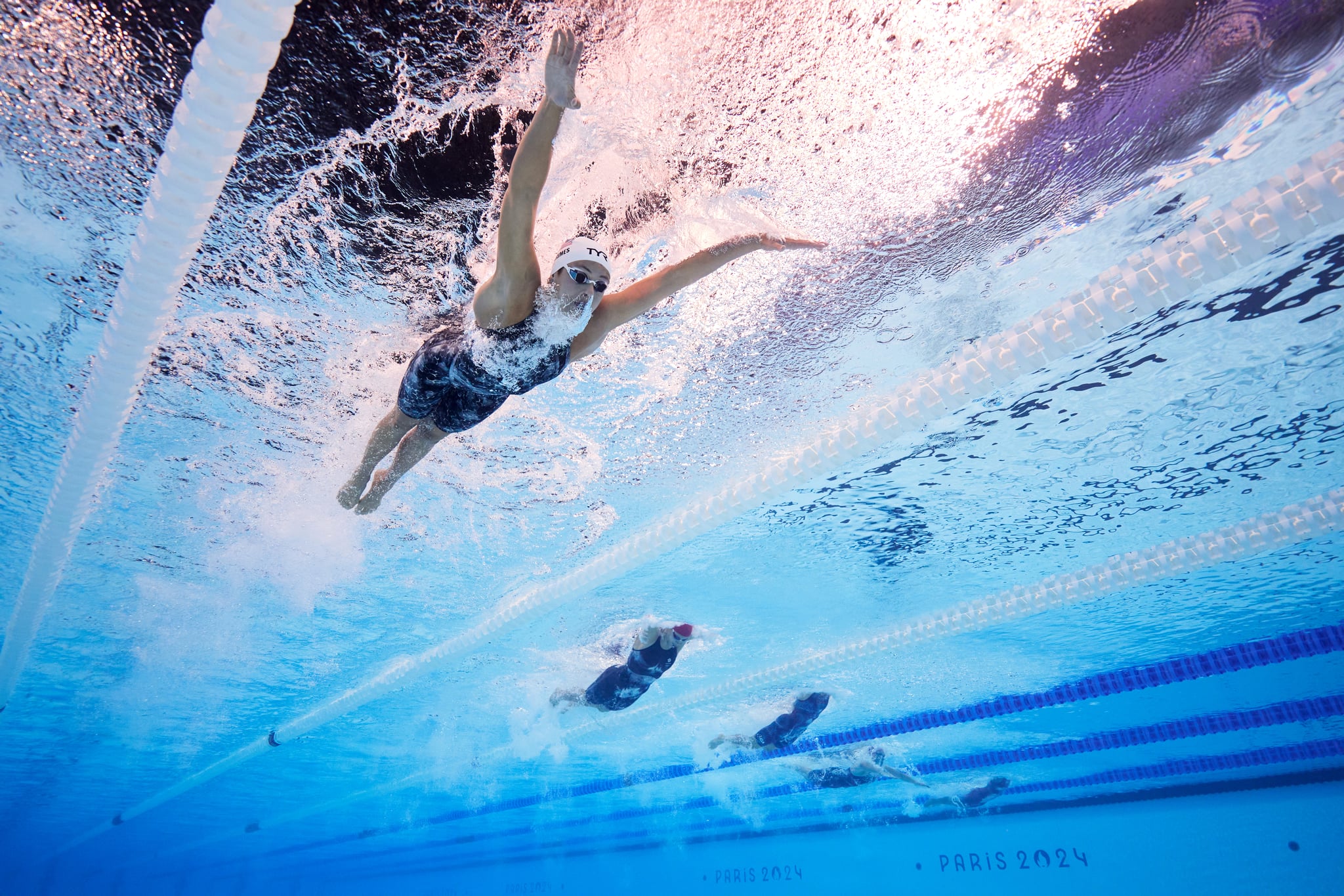 NANTERRE, FRANCE - JULY 29: (EDITORS NOTE: Image was captured using an underwater robotic camera.) Katie Grimes of Team United States competes in the Women's 400m Individual Medley Heats on day three of the Olympic Games Paris 2024 at Paris La Defense Arena on July 29, 2024 in Nanterre, France. (Photo by Maddie Meyer/Getty Images)