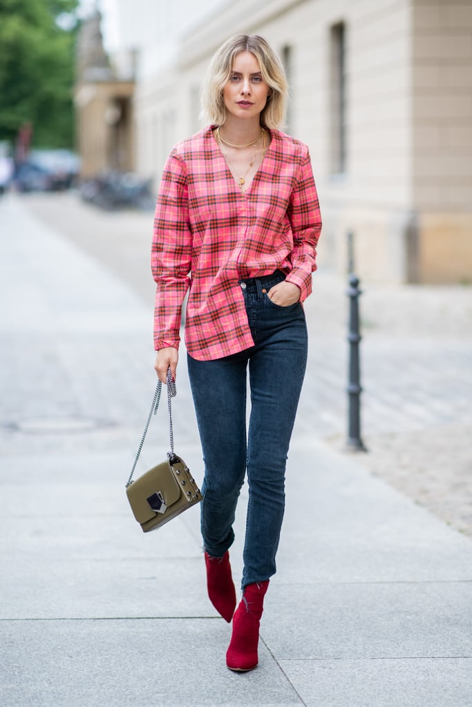 Style a fashion-tuck of a borrowed-from-the-boys oversized button-down, even if it is in hot pink and red!