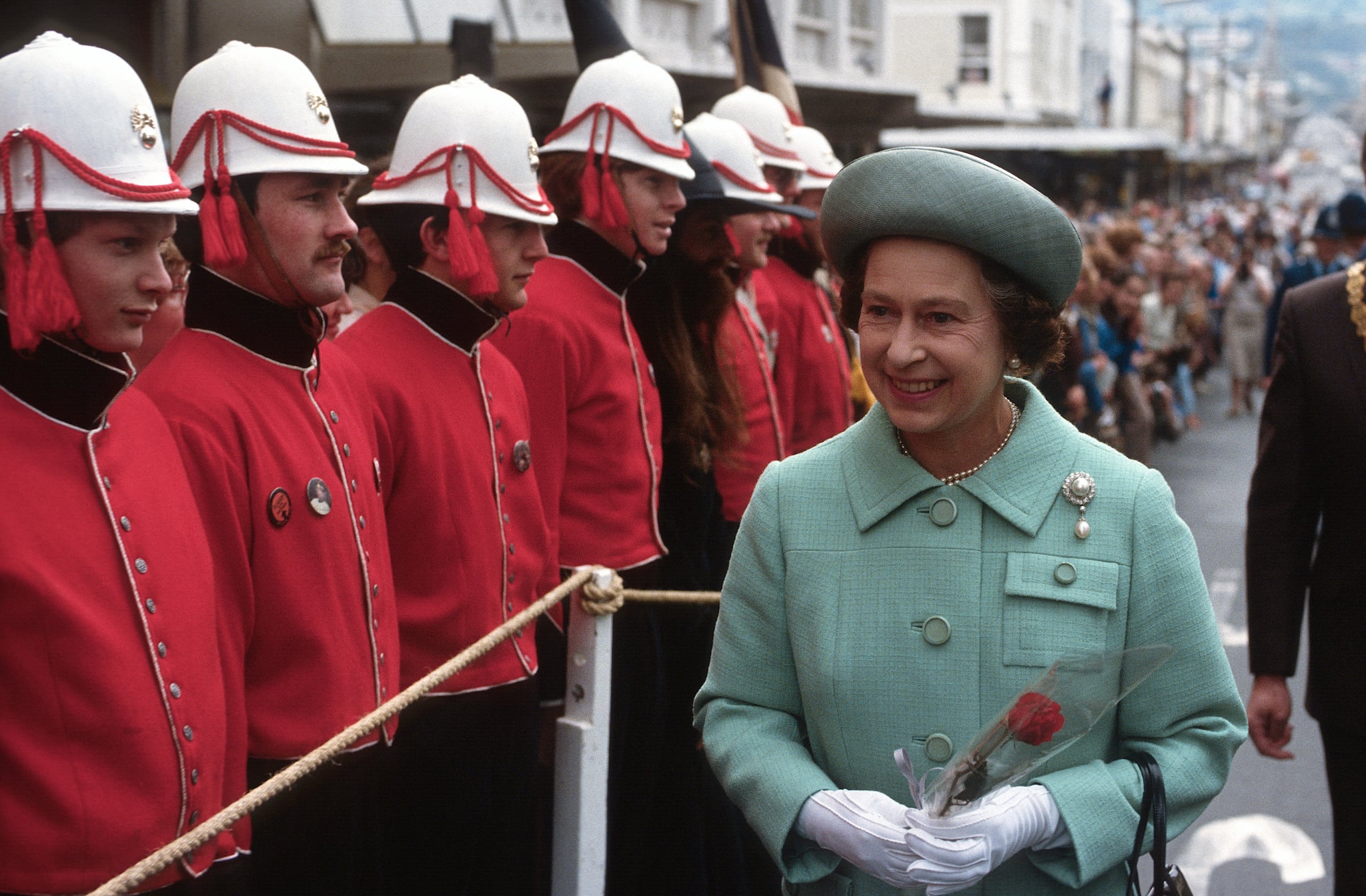 NEW ZEALAND - OCTOBER 01:  Queen Elizabeth ll smiles during an inspection as she tours New Zealand on October 01, 1981 in New Zealand. (Photo by Anwar Hussein/Getty Images)