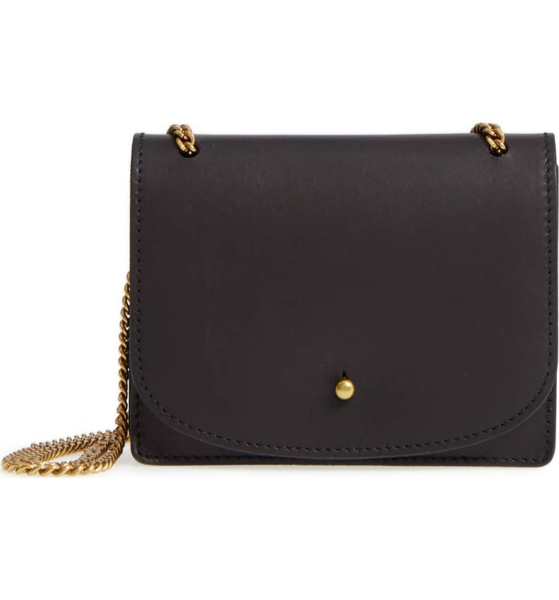 Jennifer Aniston Black Bag With Gold Chain | POPSUGAR Fashion