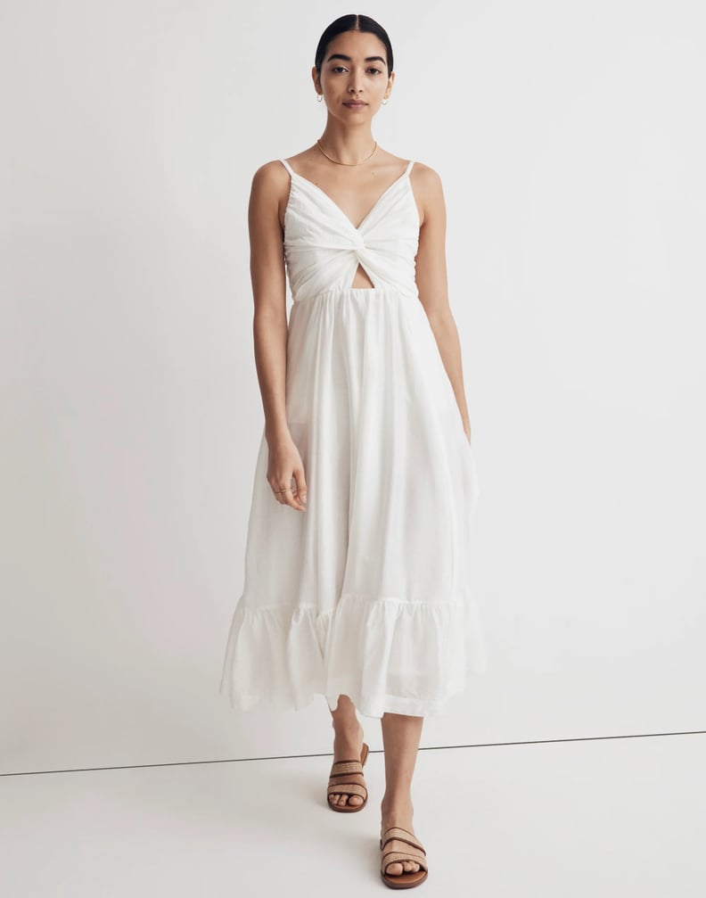 A White Midi Dress With Pockets