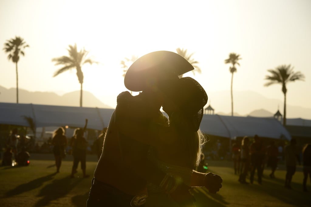 A Couple Kissed At Stagecoach Cute Couples At Summer Music Festivals