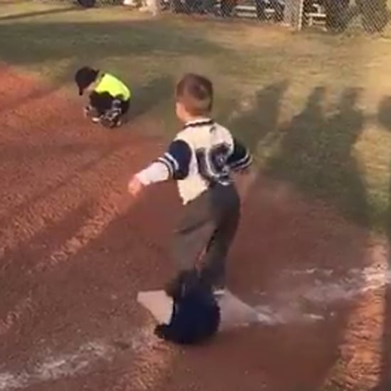 Little Boy Doing Victory Dance at First Base