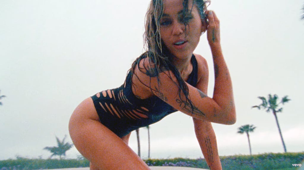 Miley Cyrus's Black Versace Cutout Bodysuit in Jaded Video