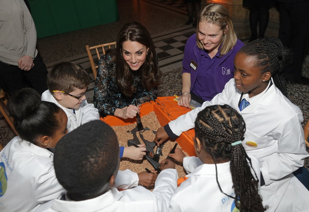 Kate looked thrilled to be hanging out with a group of kids at a tea party at the Natural History Museum in London in November 2016.