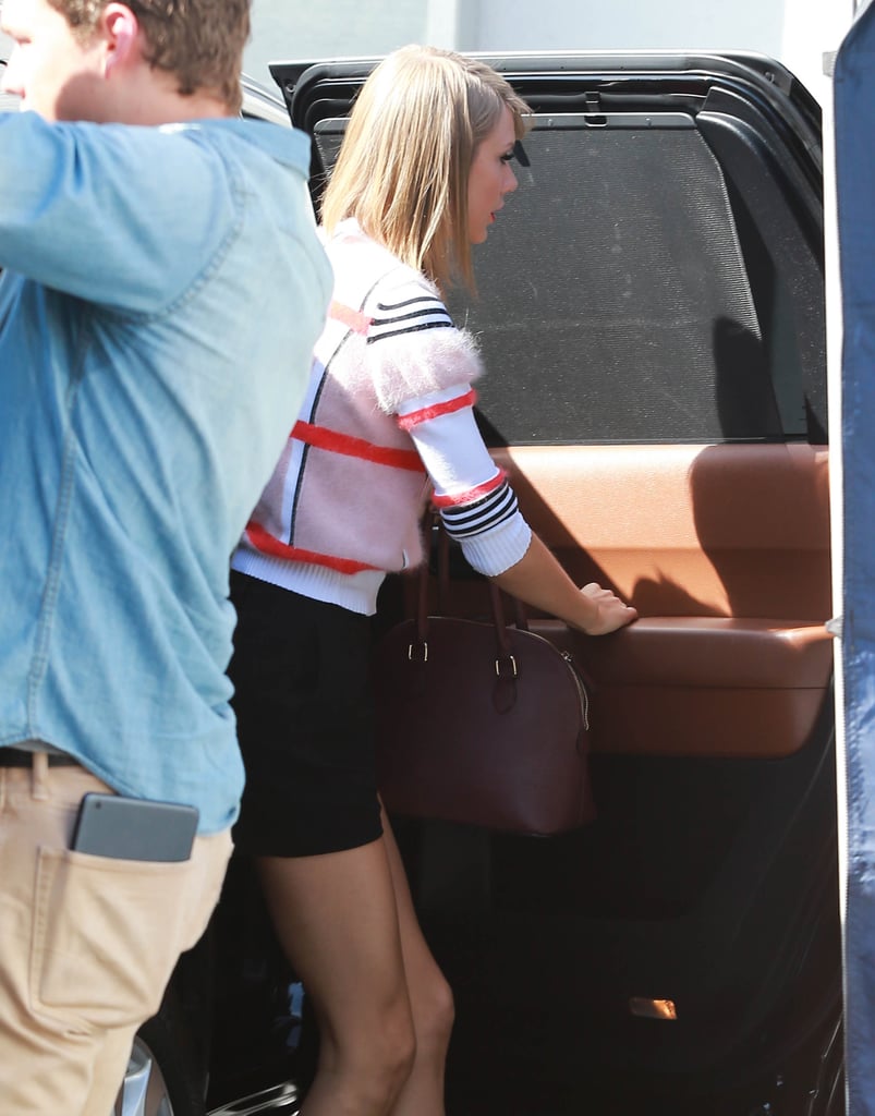 Taylor Swift made a speedy entrance into a studio in LA on Wednesday.