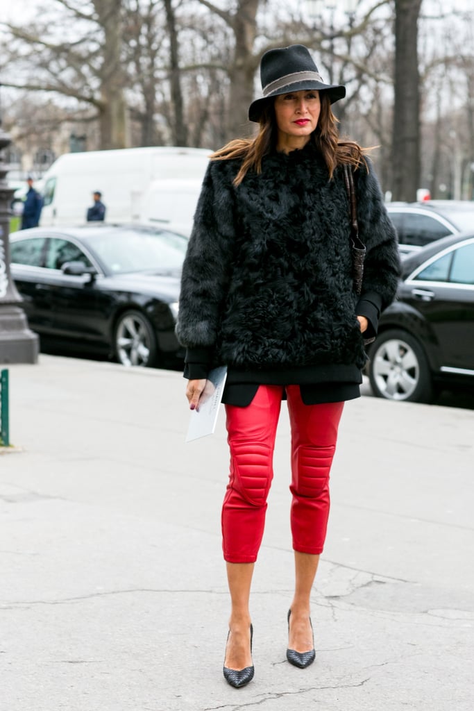 It would be hard not to notice those bright red pants, but with a furry black topper, she created an easy balance.