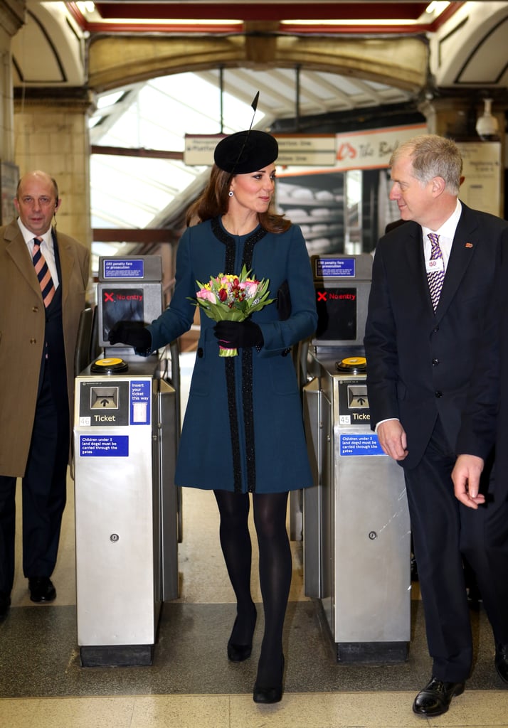 Kate toured a subway station in London with Queen Elizabeth II on March 20, 2013.