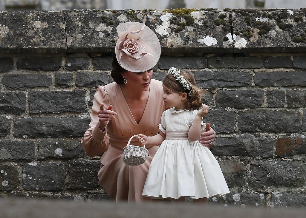 Kate made sure to give Charlotte a little flower girl pep talk before she headed inside.