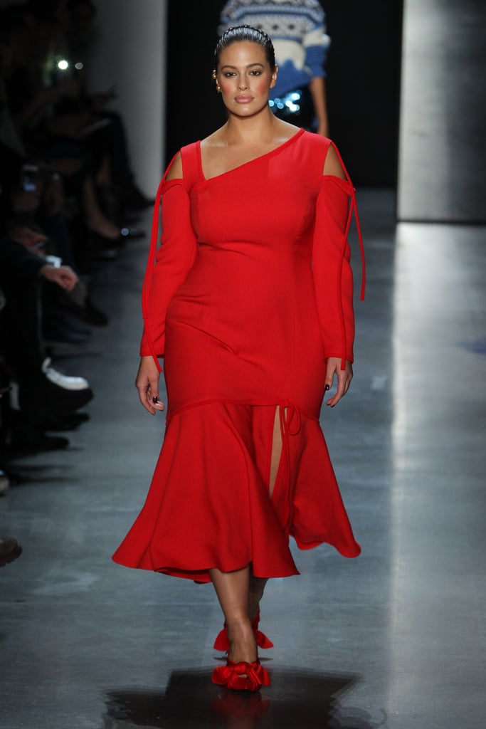 Wearing a red gown by Prabal Gurung.