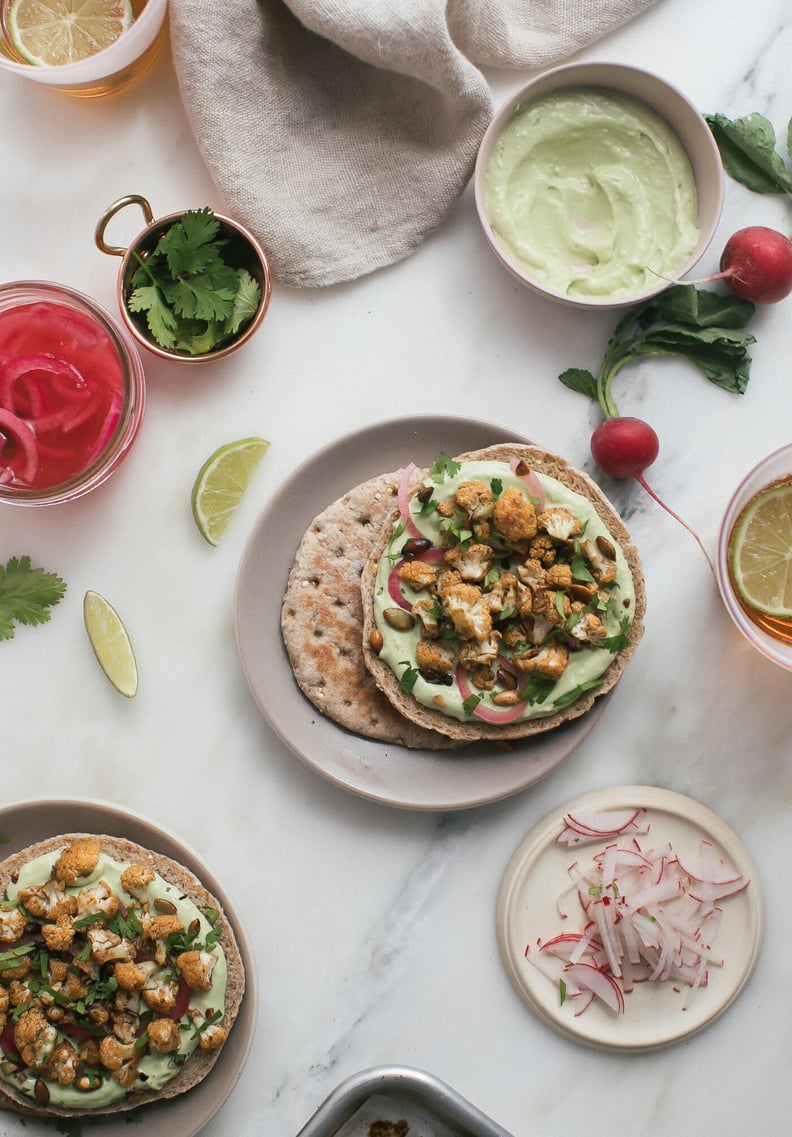 Roasted Ancho Chile Cauliflower Sandwich With Spiced Pepitas and Avocado Crema