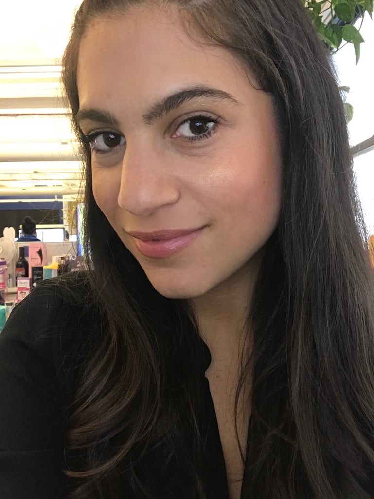 Who: Lauren Levinson, senior editor, Beauty
Complexion: Medium
Review: "It's definitely yellow gold, and I'm not mad about it. There are times you just want to, well, shine like a diamond. This is THE powder to use to do it. You'll definitely stand out, and that's OK. My hair was up for this image, but I'd love to try Trophy Wife with a deep red lip and glossy hair worn down to make my vibe more sophisticated. I did like how the gold stood out against my spray-tanned skin! Note, the glitter pigments can be a bit messy, so apply with a small brush exactly where you want it, and then mist it with setting spray."