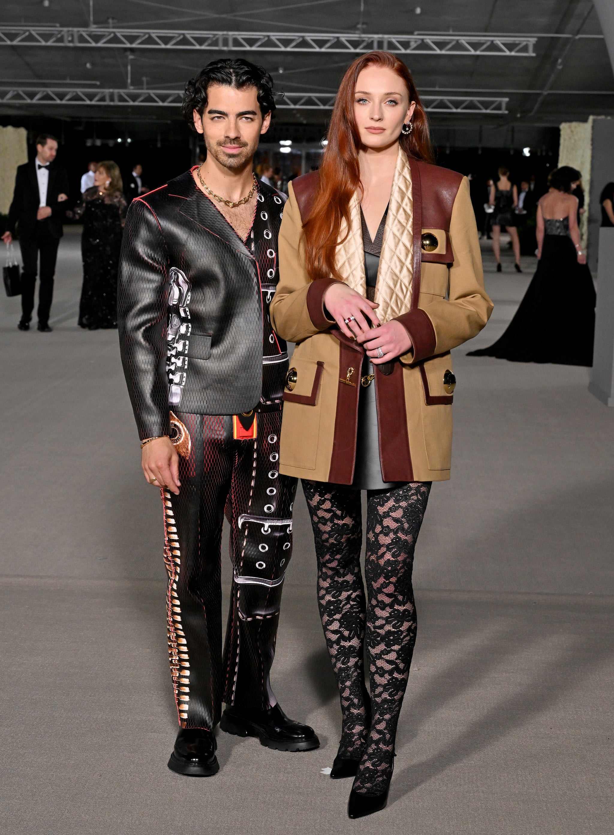 Sophie Turner Wore A Leather Blazer & LV Boots
