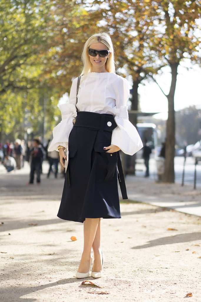 Keep it classic, but reinvent the skirt and top look with one of Fall's billowing statement blouses.