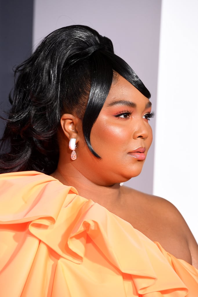 Lizzo's Miniature Valentino Bag and Orange Dress at the AMAs