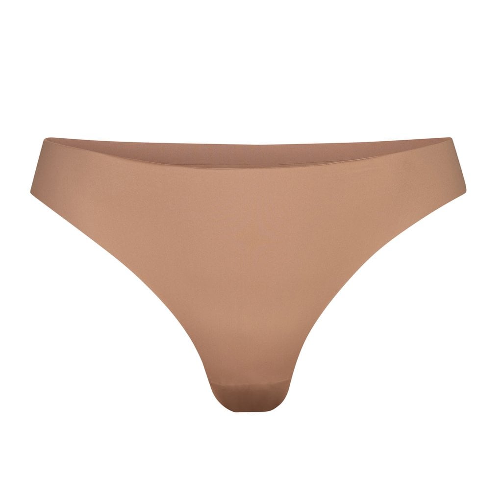 Skims Smooth Essentials Dipped Thong - Sienna, Kim Kardashian's New Skims  Smooth Essentials Collection Promises an Invisible Look and Feel