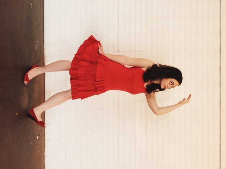 22. The Dancing Emoji Lady Red dress, red heels, and stiff dancing