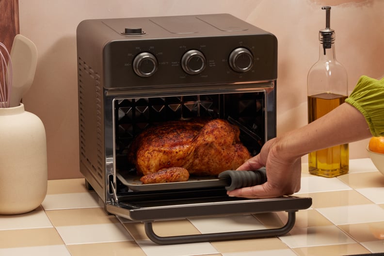 The Our Place Wonder Oven being used to roast a chicken