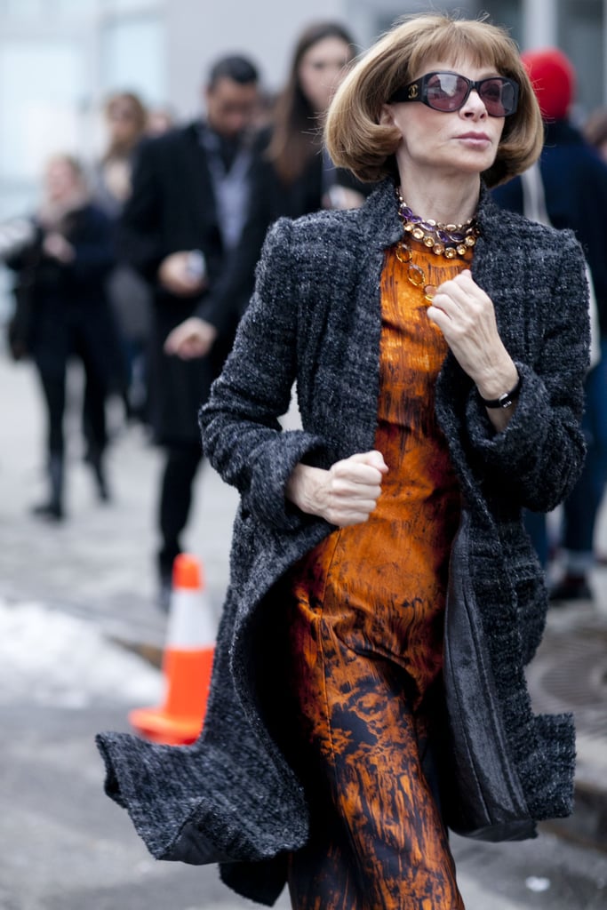 Anna Wintour made a stylish run around the tents in tweed and an abstract-print sheath.
Anna Wintour made a stylish run around the tents in tweed and an abstract-print sheath.