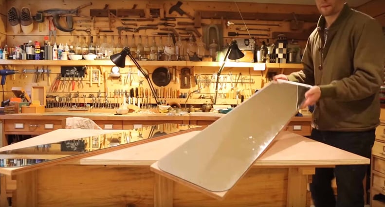 First, he glued large mirrors on water-resistant marine wood.
